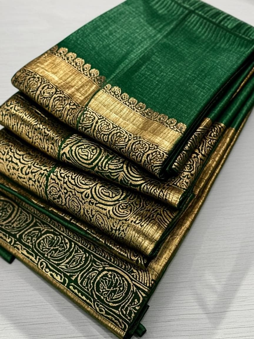 Mysore silk saree in emerald green with a gold pallu